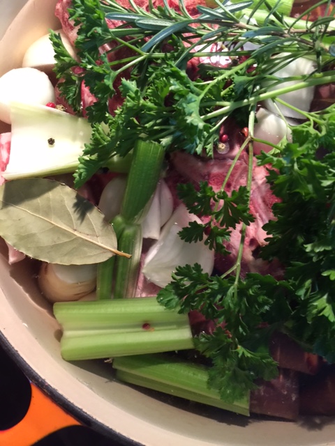 Beef bone broth ready for the oven.